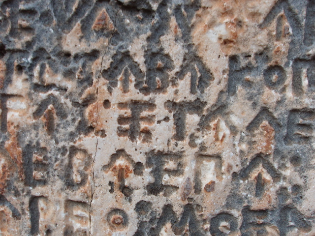 Lycian script on lion tomb at Kas -  Lycian coast Turkey 2008